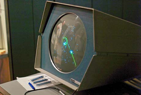 Spacewar game on a computer screen.